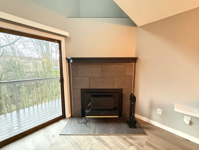 Photo - Charming 2-Bedroom Tukwila Townhome with Garage, Parking, Stainless Steel Appliances & Fireplace ...