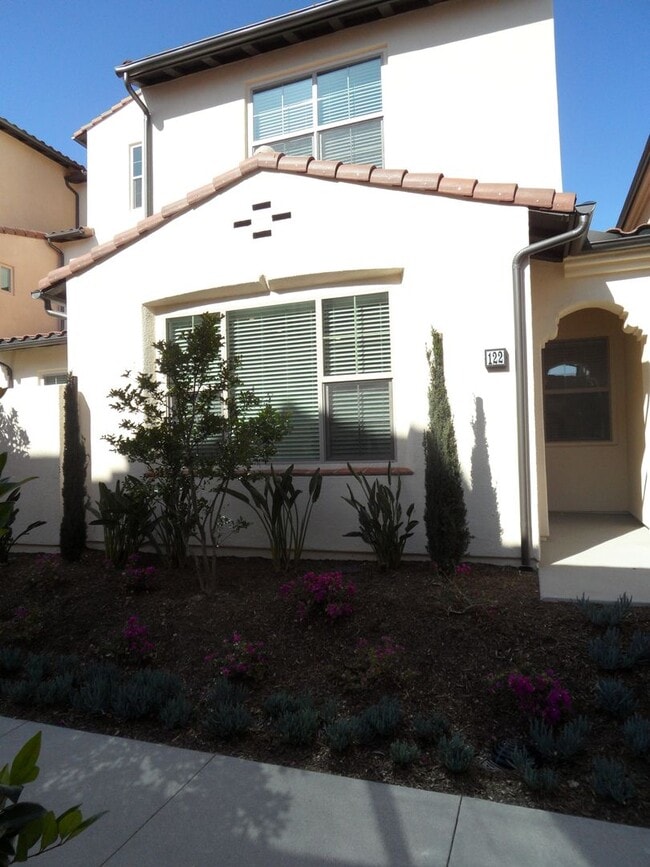 Photo - 4BR 3BA two-story condo with 2 Car Attache...