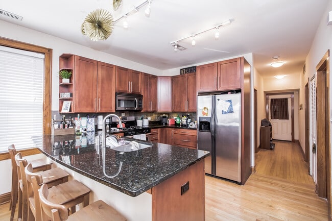 Photo - HUGE Condo Quality 3bed/1bath in Bucktown!  Central Air! In-unit Laundry! Private Deck! Unit 1