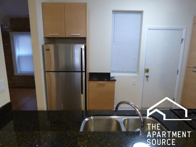 Building Photo - 1336 W Estes Ave Unit 1N Rental