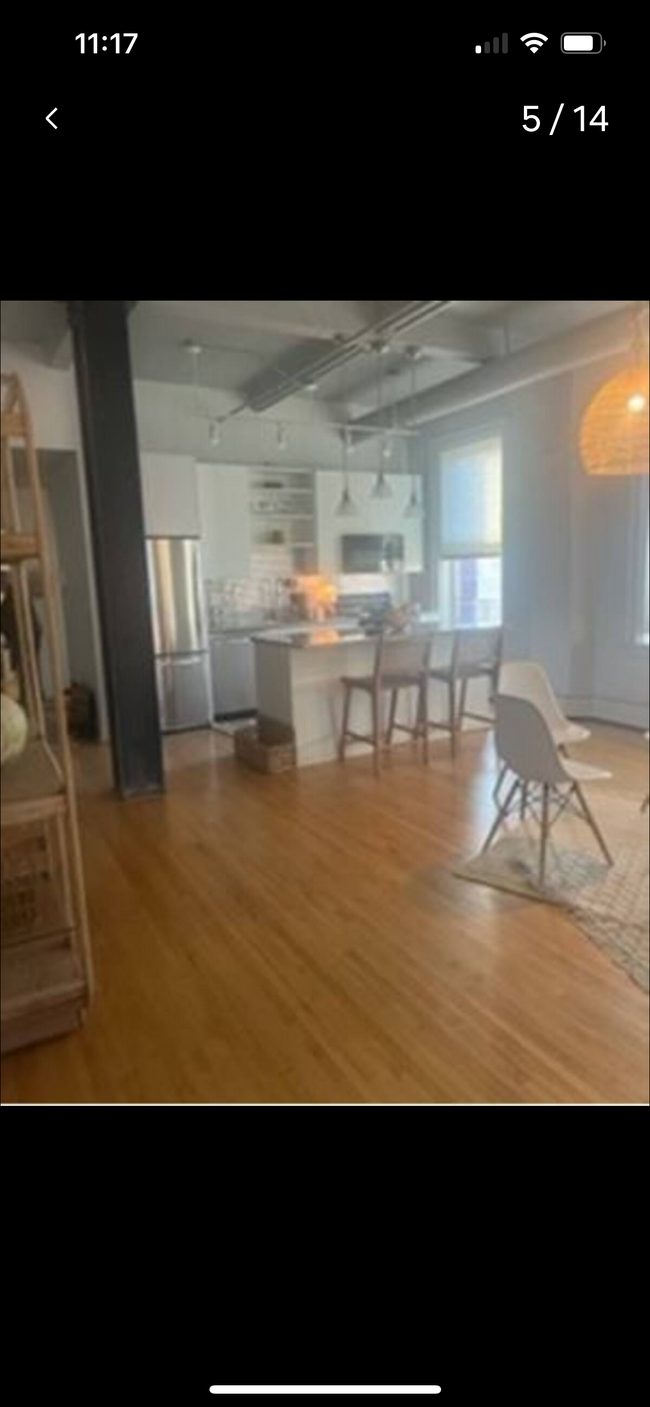 Kitchen/ LIving room - 1 E Broadway St Unit Modern Uptown Condo