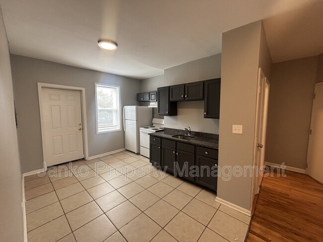 Building Photo - 1465 E 68th St Unit 2