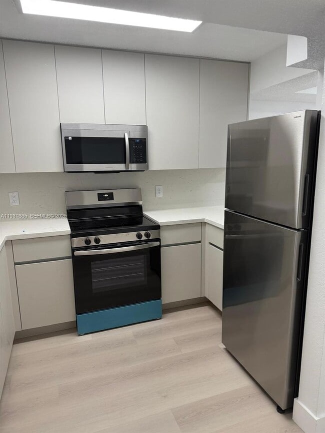 Photo - 7835 W 30th Ct Unit G-210