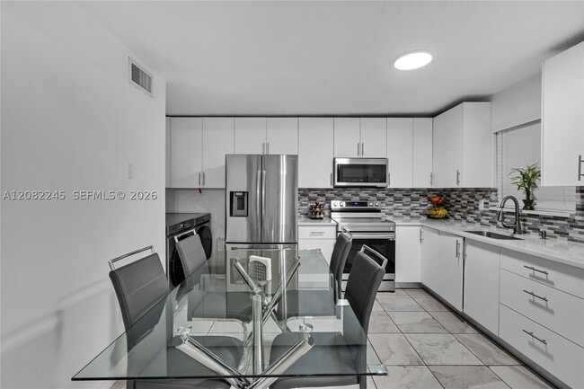 Building Photo - 329 W 68th St Unit 203