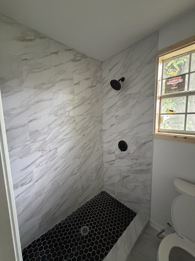 Photo - Spacious 3-Bedroom, 2-Bath House – Unfurnished