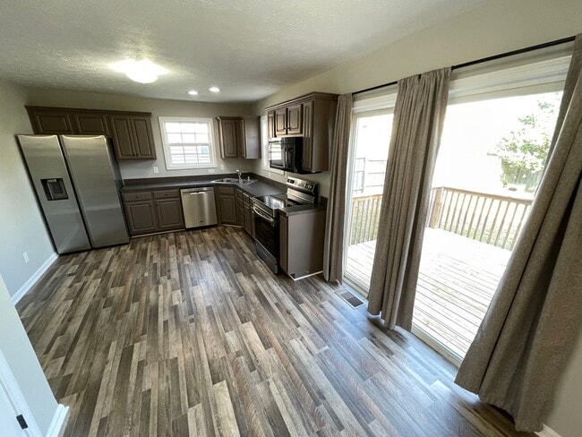 Photo - 4 Bedroom Home w/ 2 Car Garage