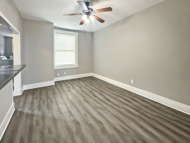 Photo - Modern Finishes, In-Unit Laundry & Bright Living Spaces