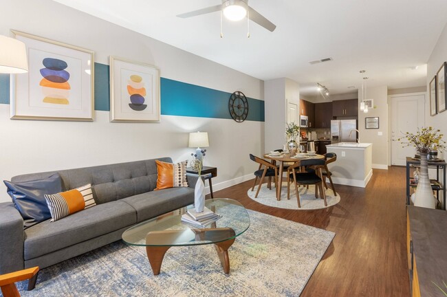 RiverfrontPark_interior_living room kitchen - AMLI Riverfront Park Apartments