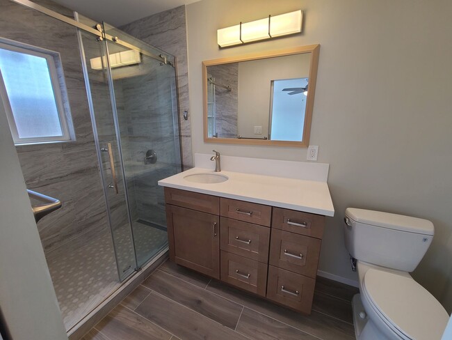 Photo - Spacious 4 bed 2 bath + 2 car garage & large backyard.