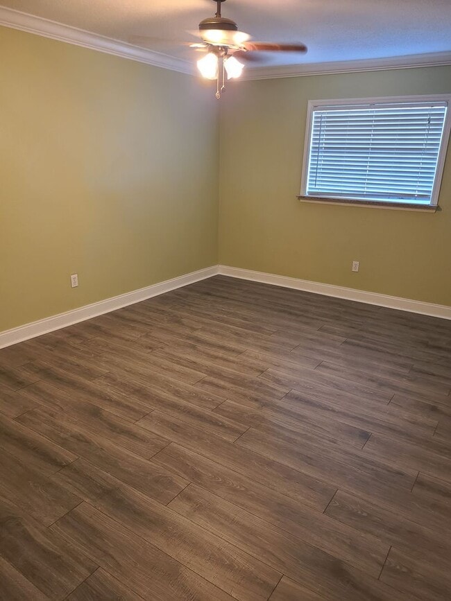 Photo - 1.1 New laminate flooring - looks amazing- Community Pool and Laundry facility