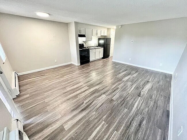 Explore this contemporary space blending comfort and style with its open-plan design. - Monte Vista