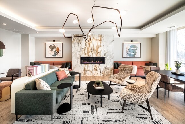 Resident lounge with fireplace and ample seating