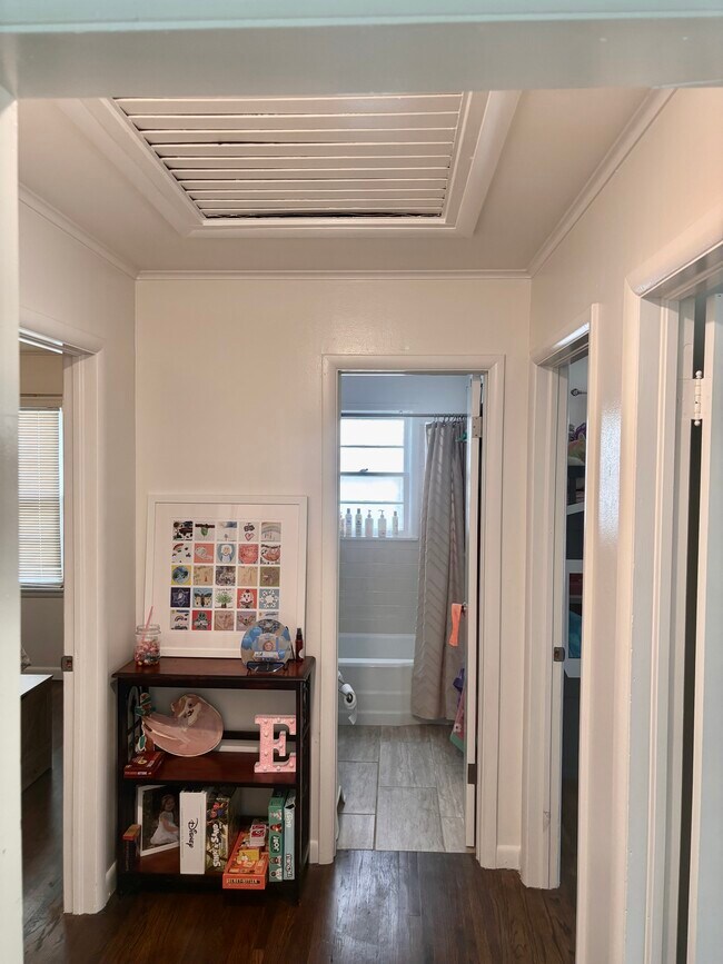 Lookin into the hallway with the 3 bedrooms and 1 bath. Looking from living room - 3516 E 30th St