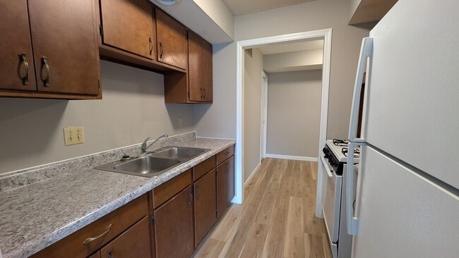 Photo - Updated Urbana Apartment with Balcony & Covered Parking