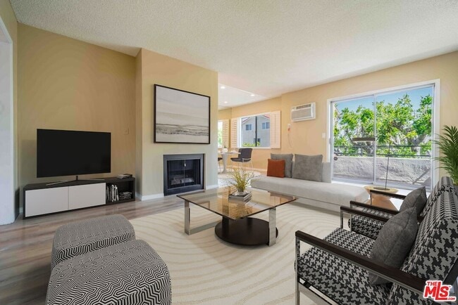 Building Photo - 11871 Idaho Ave Unit 8