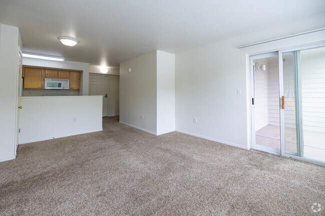 Living Room & Balcony - Creekside Manor