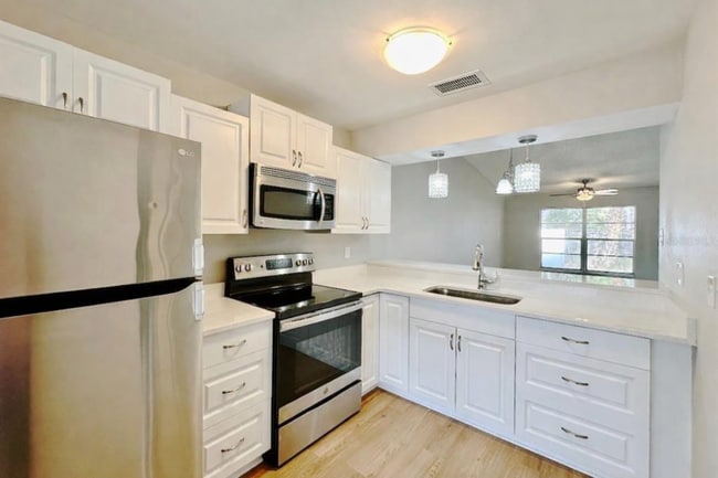 Photo - 7135 Parkside Villas Dr N Unit 7135