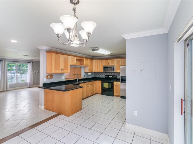 Photo - 10869 NW 3rd Ct