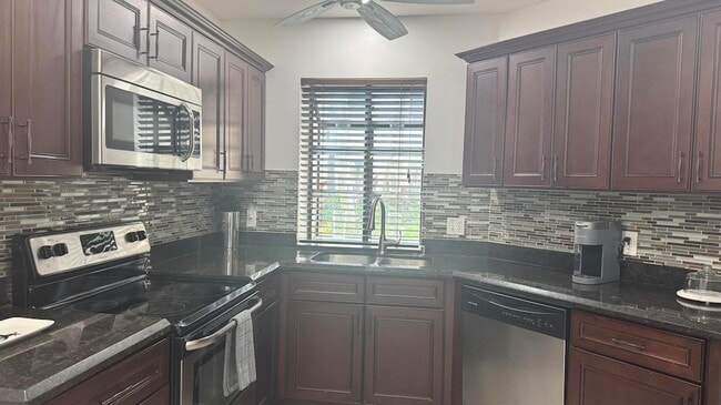 Building Photo - 5195 Europa Dr Unit H