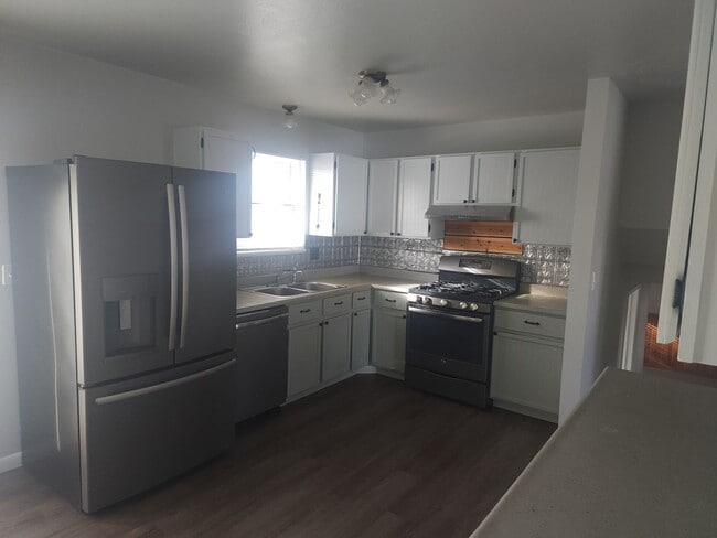 Photo - Shop-Ready 4BR Home with Lift-Ready Detached Garage & RV Parking Near Downtown Firestone