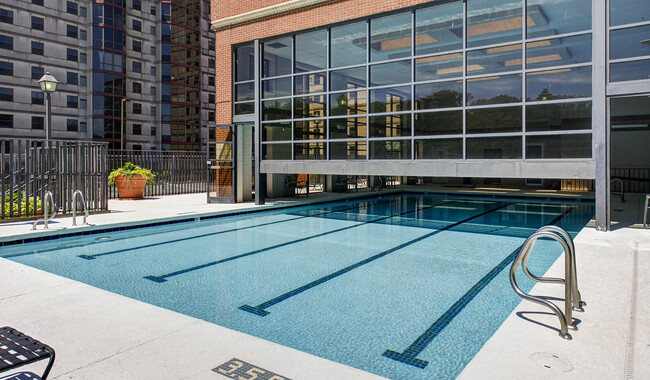 Your new pool is indoor/outdoor to enjoy year round - Huntington Gateway Apartments