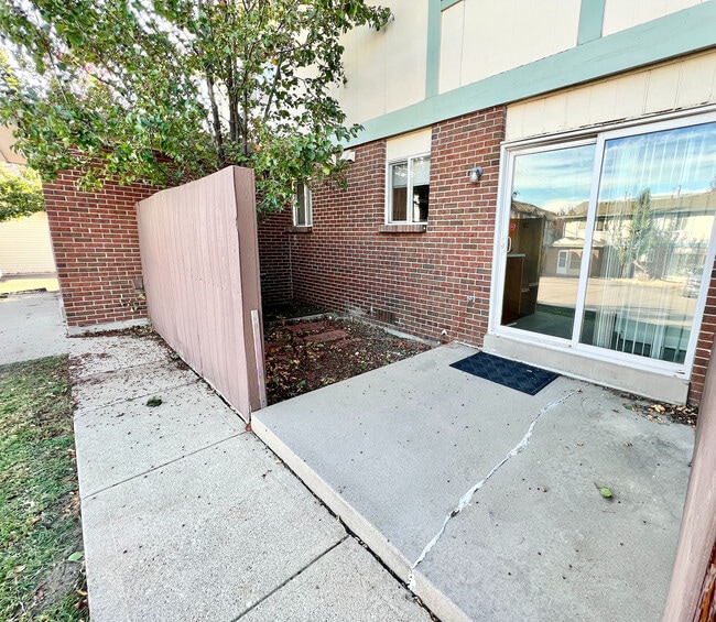 Step into relaxation on this cozy patio, perfect for enjoying peaceful mornings. - 10756 West 12th Lane