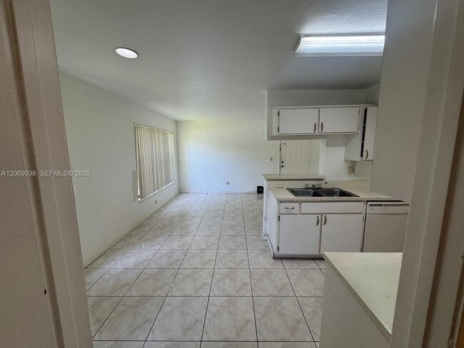 Building Photo - 8793 NW 39th St Unit .