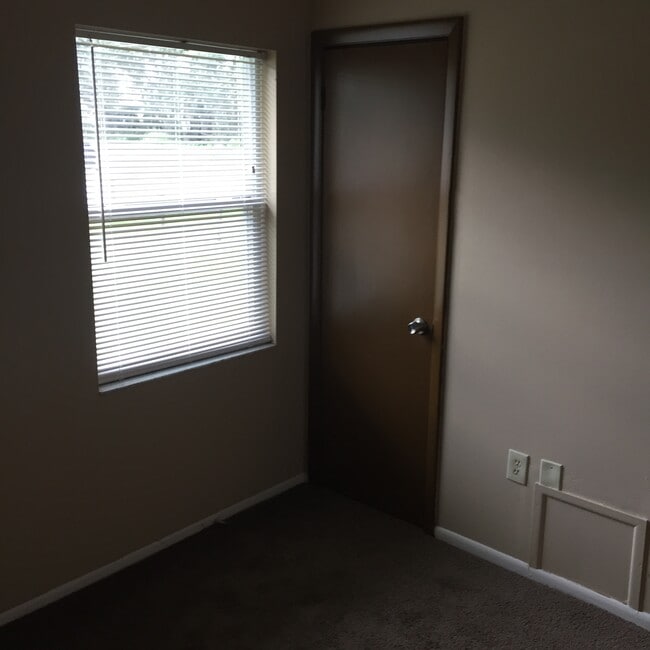 2nd Bedroom with single closet, newer carpet. - 2410 S San Gully Rd