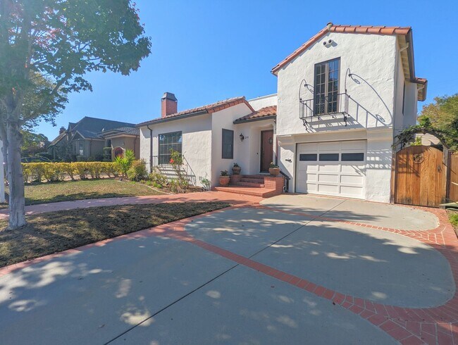 Photo - Spanish-Style Home on Treelined Street in ...