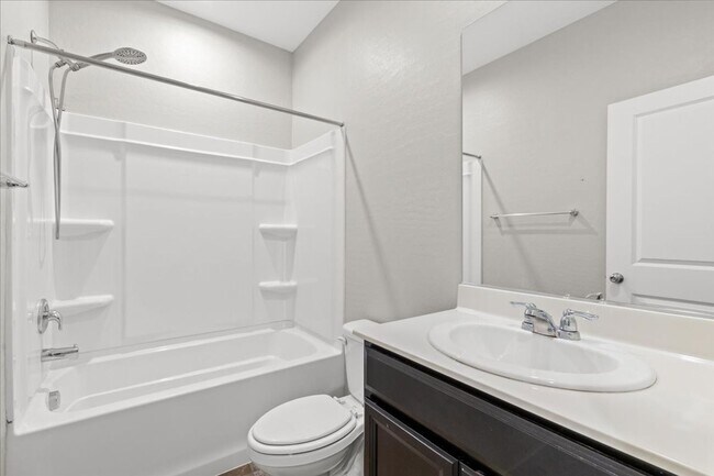 Photo - Expansive 5 Bedroom Home with Turf Backyard