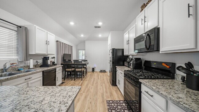 Photo - Spacious, well-maintained 4-bedroom, 2-bath single-story home designed for comfortable everyday l...