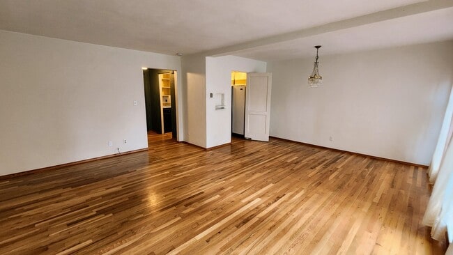 Living / dining room facing the kitchen - 6821 NE Broadway
