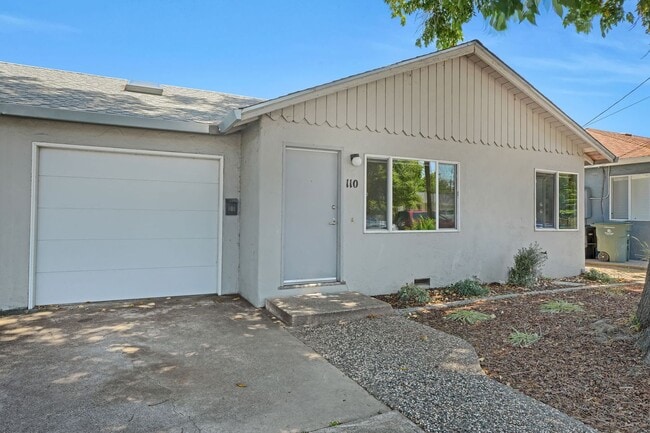 Photo - Charming 2 Bed 1 Bath Duplex Unit with Beautifully Landscaped Backyard