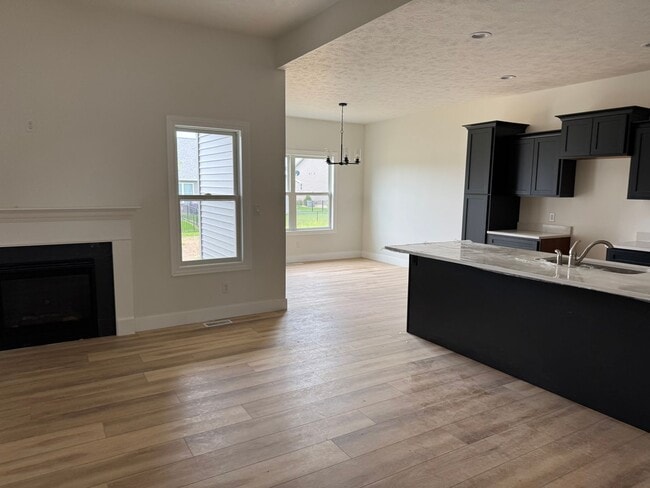Photo - New Construction! West side location. 4br, 3bth, 2crg, Finished basement. All new stainless steel...