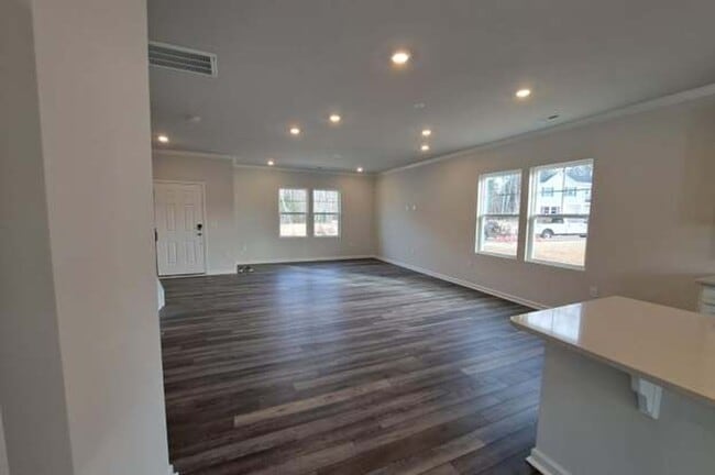 Photo - 3 BR/2.5BA | Newly Renovated Townhome End Unit | Private Patio| In Raleigh!