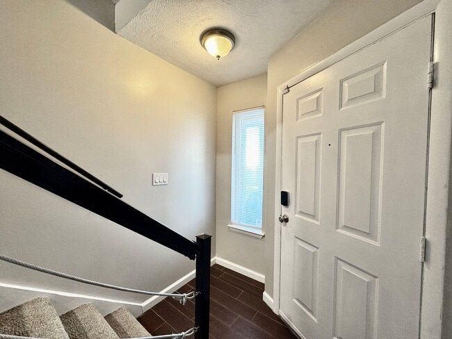 Photo - Freshly painted & Available NOW! Tri-Level...