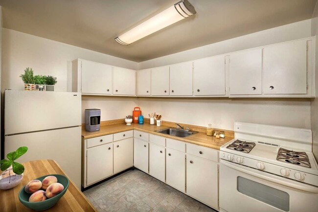 Well-equipped kitchen at Lansdowne Village Apartments in Landover, MD