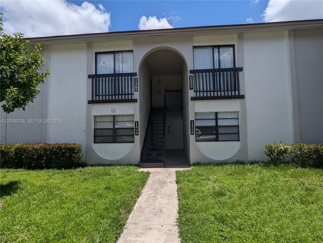 Building Photo - 11777 NW 30th St Unit 206A
