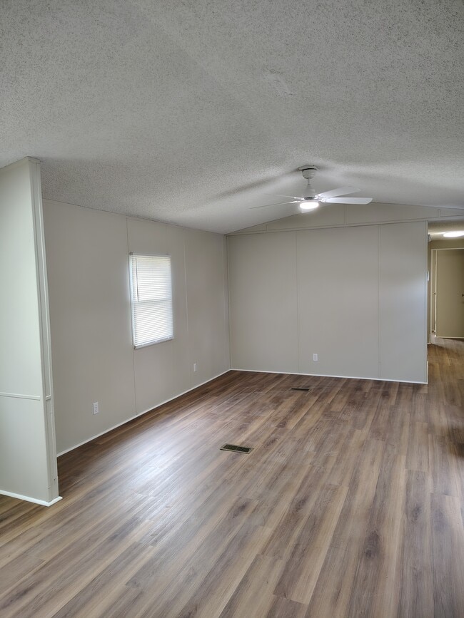Spacious LR with new LVP flooring throughout - 13 Ez Ln