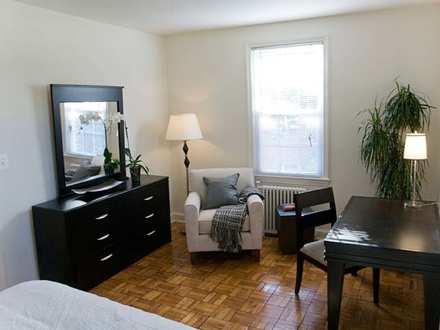 Bedroom with hard surface flooring