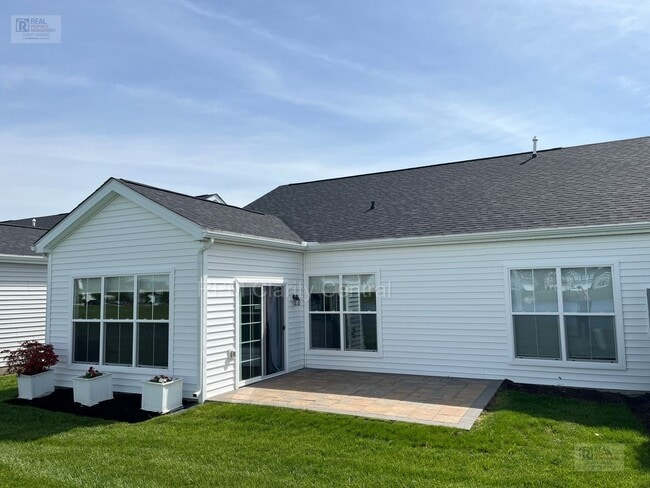 Photo - Beautiful 3BR Home with Pond Views, Modern Finishes & Low-Maintenance Living