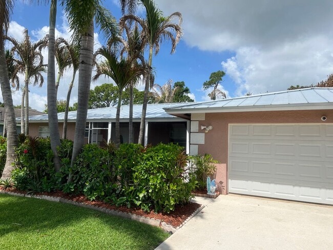 Photo - 3 BEDROOM 2 BATH CONVENIENTLY LOCATED WITH A TROPICAL OASIS IN THE BACK YARD!
