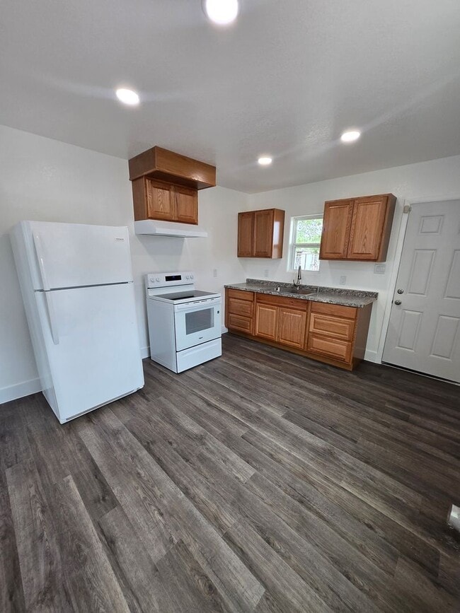 Photo - New paint and flooring throughout.