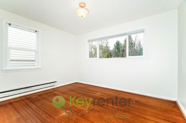 Photo - Stylish Three Bedroom Retreat with fully fenced yard and storage!