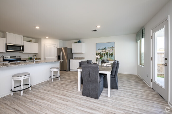 4BR, 2BA - 1,819SF - Dining Room - Villas at Oak Bend - Home Rentals