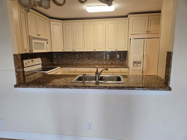 Photo - 10777 W Sample Rd Unit 1104