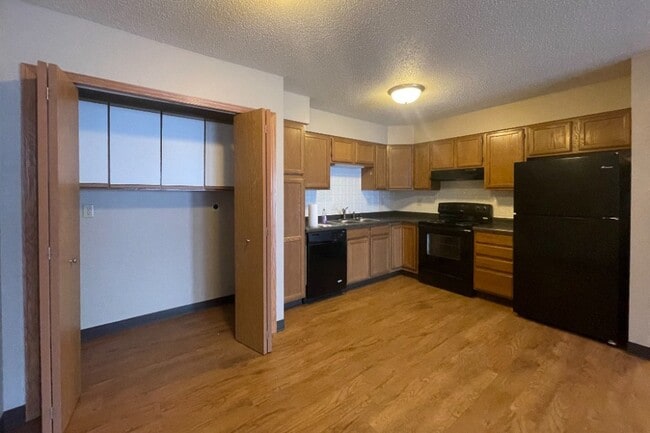 Cocina con conexión para lavandería - CROSBY COUNTRY APARTMENTS