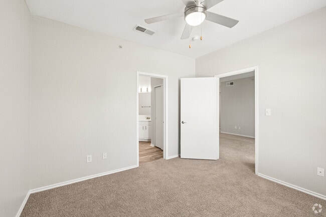 3BR, 2BA - 1,165SF - Primary Bedroom