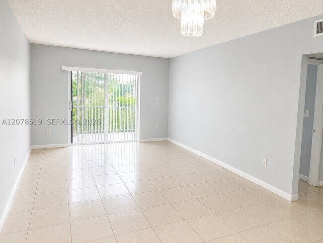 Photo - 10850 W Flagler St