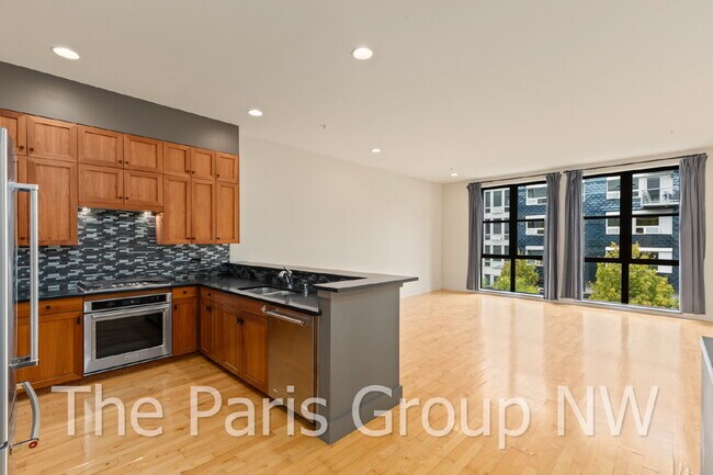 Exceptional 2 Story CapHill Condo * 2 Pkg Spaces, EV Charger & Rooftop Views